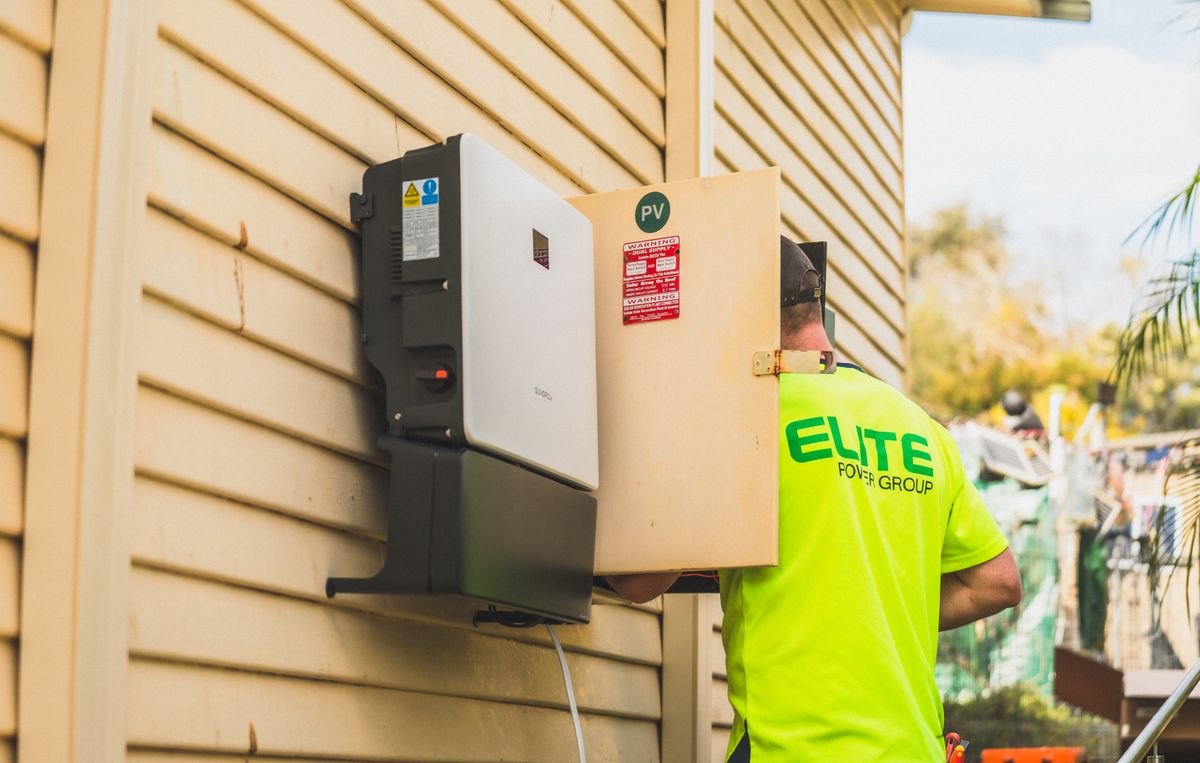 Inverter and battery unit mounted on a wall