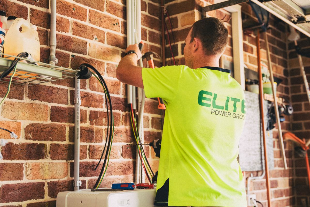 Battery storage unit being installed alongside an inverter