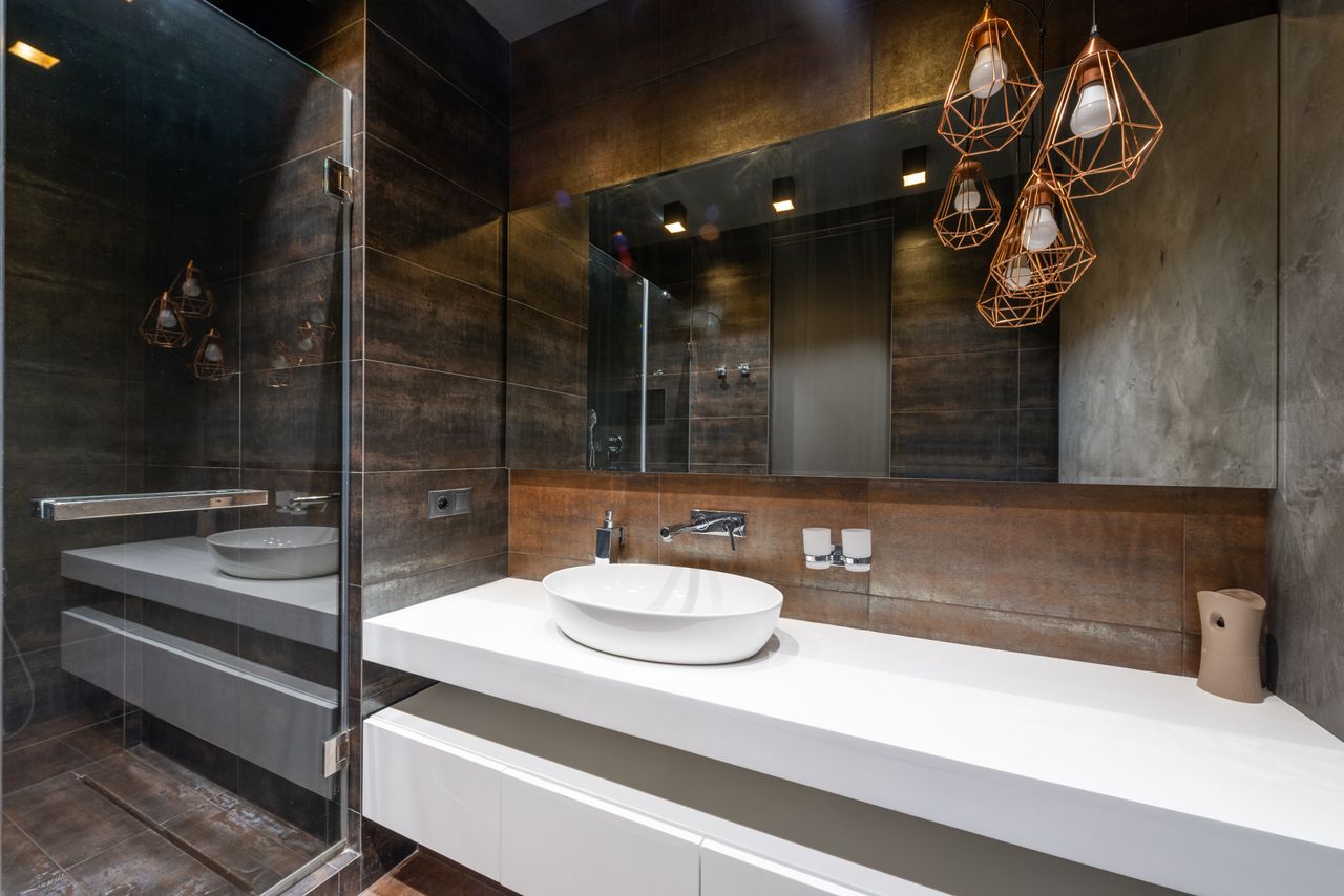 Bathroom with pendant lighting and contemporary basin
