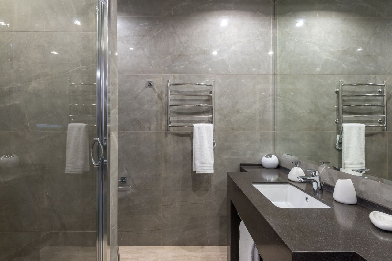 Completed modern bathroom with glass shower