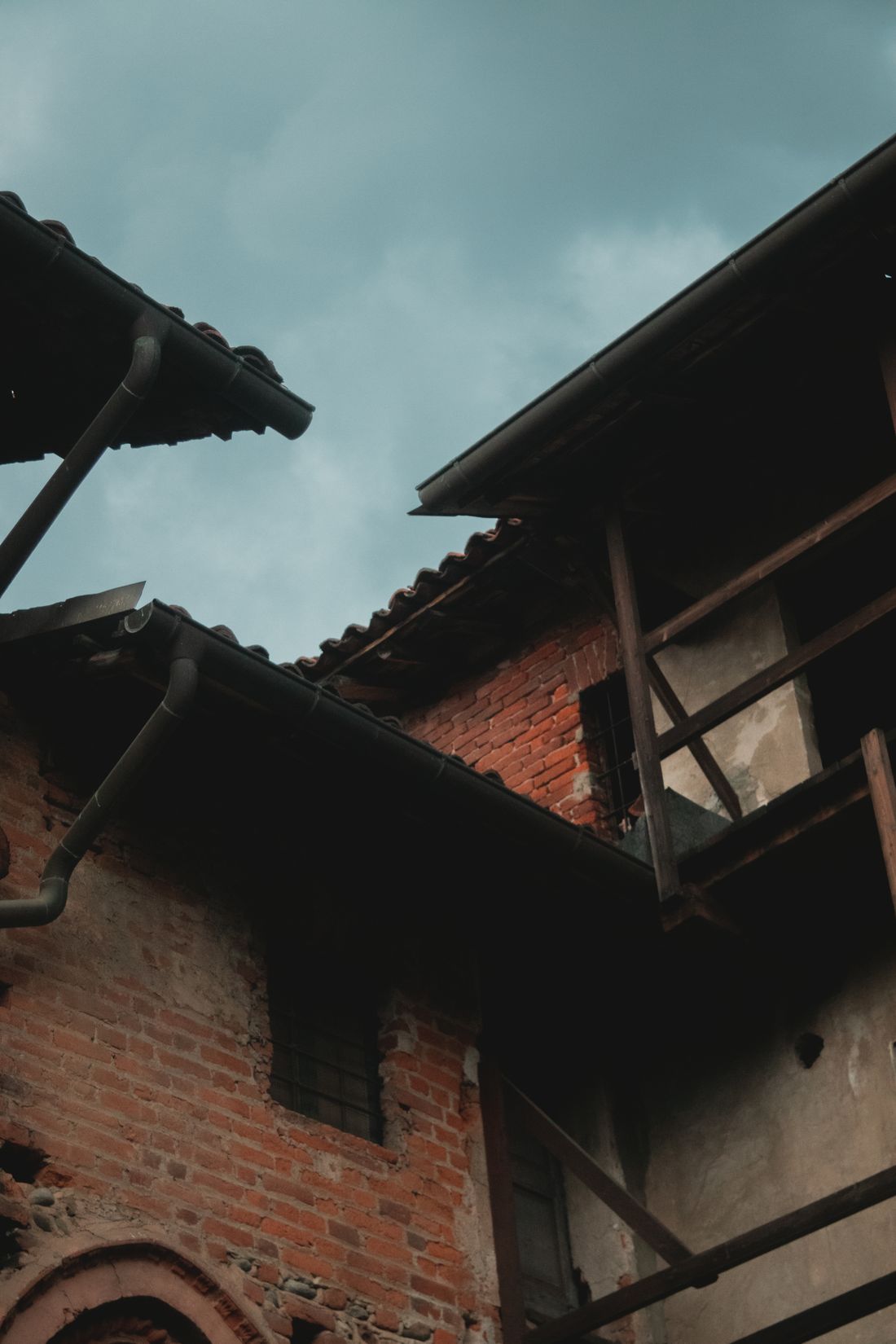 Rooftops of a row of brick houses